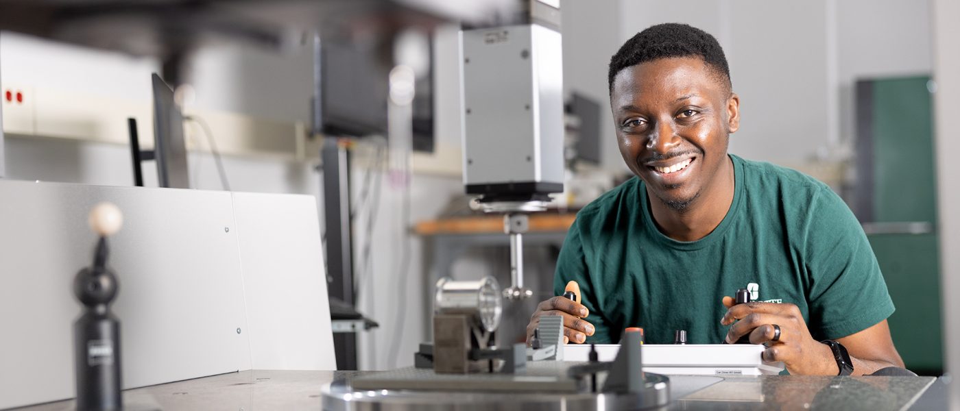 Student at machine in Metrology Lab